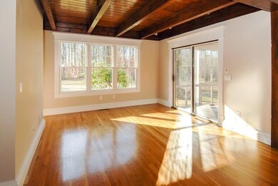 Sitting area with sliders that lead to a large scr