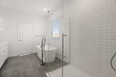 Primary bath with freestanding soaking tub