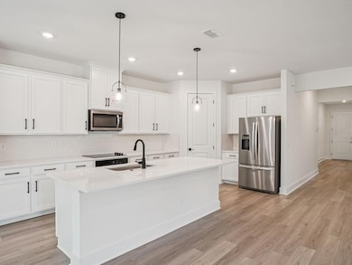 Photo is not of the actual home, but is an inspirational photo of builder’s model home and may depict options, furnishings, and/or decorator features that are not included