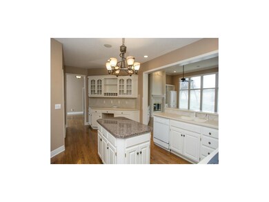 Kitchen features center island, butler's pantry, a