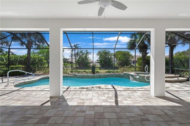 Pool with an in ground hot tub, a lanai, a ceiling
