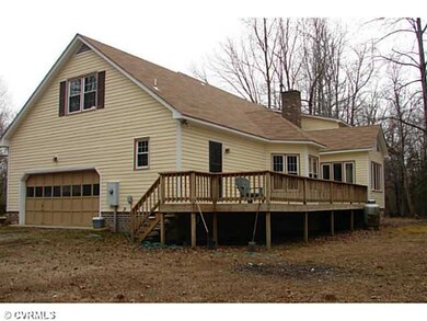 Exterior Back - Rear of home showing side load gar