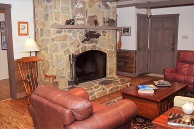 It's cozy by this stone fireplace!