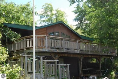 The deck area overlooks a marsh that has lots of w