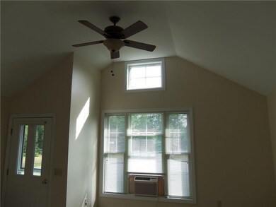 VAULTED CEILING OF THE LIVING ROOM