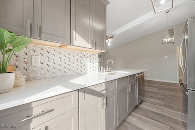 Kitchen with appliances with stainless steel finis
