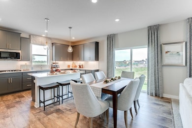 Nice sized eat-in-kitchen. Model picture shown.