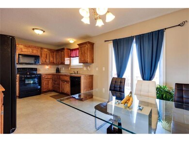 View from dining table towards sink area.