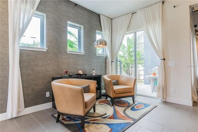 Living room view, patio door to covered porch and 
