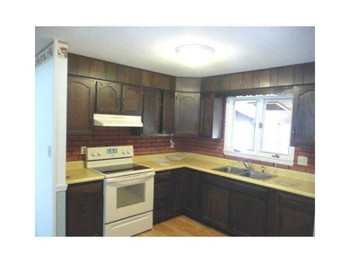 Kitchen. Kitchen right off glassed...