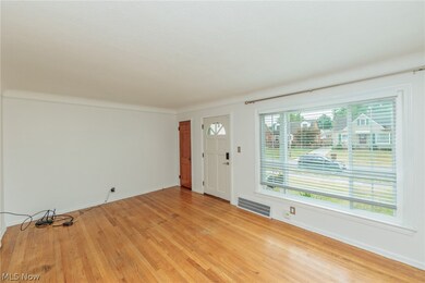 Entryway with light hardwood / wood-style flooring and a wealth of natural light