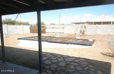 backyard with pool covered