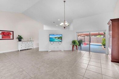 Spacious living room with high ceilings.