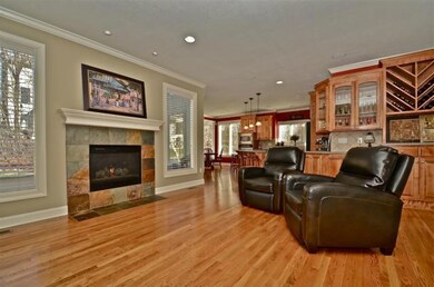 Hearth room adjoining kitchen with cozy fireplace 