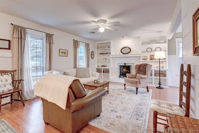 Living room with decorative fireplace and built in