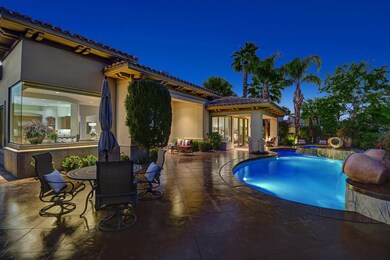 POOL DECK TO POOL AND HOUSE NIGHT MLS