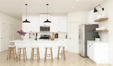 Kitchen with pendant lighting and floating shelves