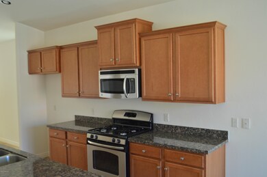 Staggered Maple Cabinets