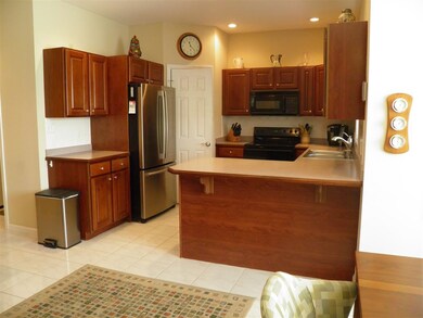 Kitchen appliances are included.