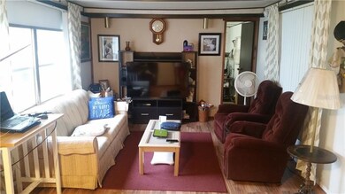 Living room features new windows, new laminate flo