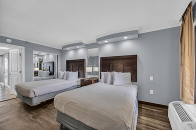 Bedroom featuring baseboards, recessed lighting, d