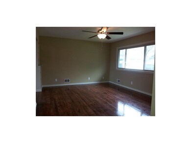 Refinished hardwood floor.