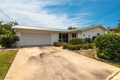 Ranch-style home with a garage