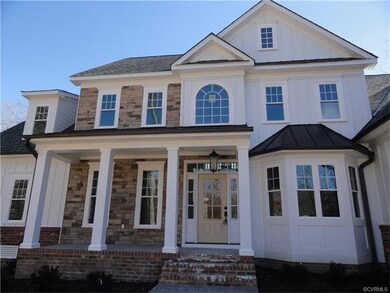 Front entrance with concrete porch