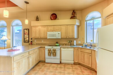 Open Kitchen with Rich Wood Cabinets