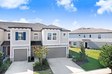 31886 Blue Passing Loop, Wesley Chapel, FL 33545 - photo 2