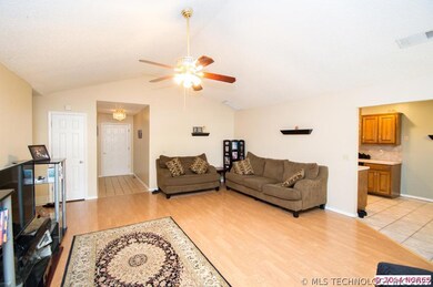 View of front entryway leading into living room.