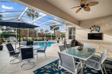 View of patio / terrace featuring outdoor dining area, a sunroom, a lanai, and a ceiling fan