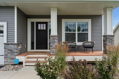 Gorgeous exterior stonework and a covered porch