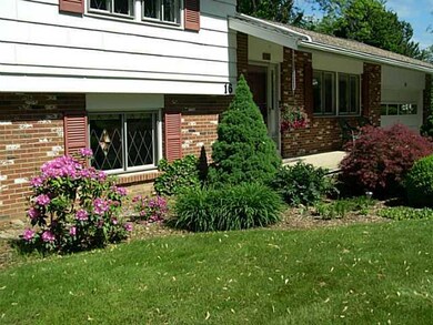 Exterior Front. Nicely landscaped all around.