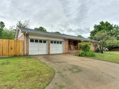 Single story home featuring an attached garage, br