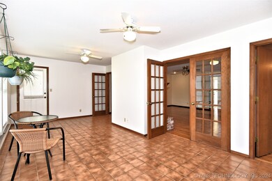 Tiled Sunroom, French Doors from Living