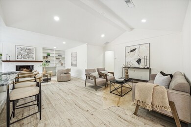Enjoy this light-filled living room featuring rece