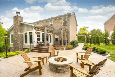 Enjoy an evening around the stacked stone fire pit.  Gas lanterns surrounding the patio create such ambiance. 