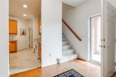 Front Foyer with Light Wood-Type Flooring.