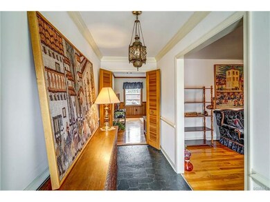 Foyer is open to living room and family room