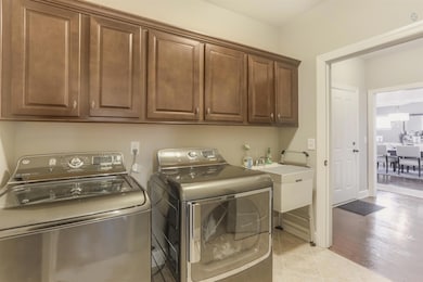 Look at all Of the Closable Cabinet Space! Plus the Over Sized Laundry Sink to the Right...