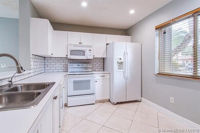 Kitchen equipped with updated recessed lighting, s