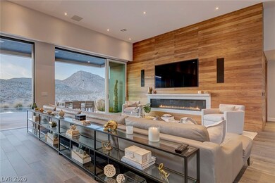 The great room wall featured is finished in walnut