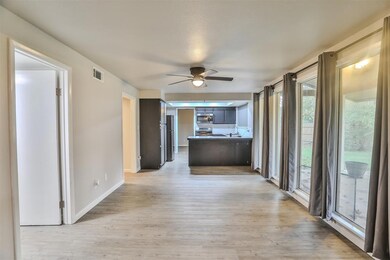 Kitchen with ceiling fan, appliances with stainles