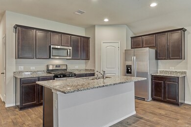 Whirlpool side by side refrigerator is included!