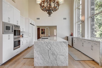 Kitchen featuring appliances with stainless steel