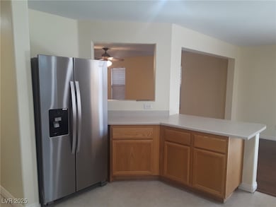 Kitchen with stainless steel fridge with ice dispe