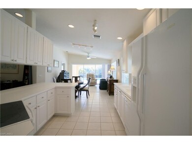 THIS BRIGHT OPEN KITCHEN LETS YOU VISIT WITH GUEST