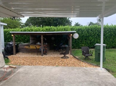 View of outdoor kitchen from back patio
