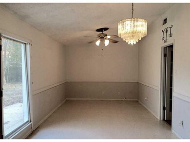 Living Room. Open to dining room and kitchen